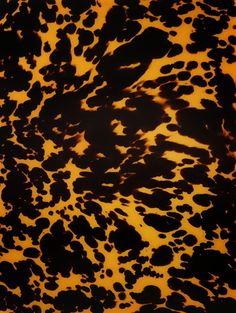 an orange and black animal print background