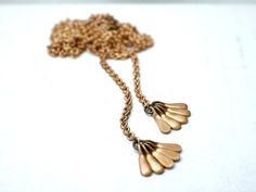 Long brass tassel necklace  vintage drops on raw brass  by illusy, $25.00 Gold Copper Teardrop Pendant Jewelry, Gold Dangle Necklace In Copper, Back Chain, Handmade Gift Tags, Minimal Jewelry, Layering Necklace, Skull Ring, Necklace Vintage, Simple Jewelry