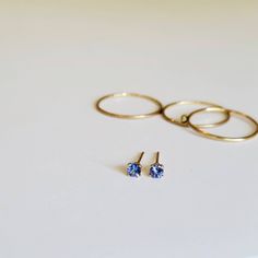 "These stud earrings feature genuine Tanzanite in a 14K Gold filled setting. They are perfect for effortless, everyday wear and transition well from day to night. Tanzanite has a rich blue color with a hint of purple. This is the birthstone for December, making it the perfect gift for December babies. DETAILS 3mm | 14K Gold filled | Genuine Tanzanite | Made to order My earrings are handmade to order and therefore one of a kind. Please also note that since I work with natural gemstones, the color 14k Yellow Gold Solitaire Earrings, Minimalist 14k Gold Round Cut Earrings, Minimalist White Gold Birthstone Earrings, Everyday Fine Jewelry Earrings With Birthstone, Fine Jewelry Birthstone Earrings For Everyday, Solitaire Round Earrings For Everyday, Everyday Tarnish Resistant Round Cut Earrings, Tarnish Resistant Everyday Earrings, Gold Solitaire Earrings As A Gift