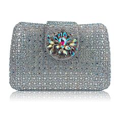 PRICES MAY VARY. ◆Unique Rhinestone Floral Evening Bag.◆ The evening bag is composed of square and round rhinestones of different sizes in a shiny, unique trapezoidal shape, elegant and stylish.Magnetic clasp, with floral rhinestone embellishment in the center. ◆Size & Capacity.◆ Dimensions: L7.48 x H4.72 x W1.57 inches, about 19 x 12 x 4 cm.Handle length: 7.87inch (about 20cm). This women's evening bag can hold your mobile phone, lipstick, keys, foundation case, small mirror, other small things