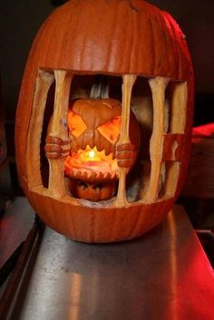 a pumpkin carved to look like a jail cell