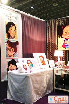 an exhibit booth with various cartoon characters on it