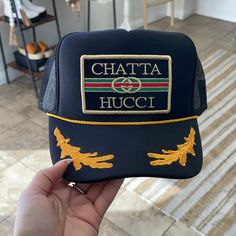 Chatta Hucci Trucker Hat Trendy Wide Brim Trucker Hat, Chic Cap Hat, One Size Fits Most, Chic One-size-fits-most Cap, Chic One Size Fits Most Cap Hat, Chic One Size Fits Most Cap, Adjustable Wide Brim Trucker Hat In Trendy Style, Trucker Hat Bar, Hat Bar, Wide Brimmed Hats