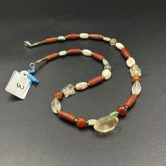 The origin of this beads from the central Asian country Afghanistan. The history of this beads is more than 2000 years old . many kingdoms passes through this countries of central Asian for example Greek roman Sasanian many others. they were used to be a jewelry ornaments and trade beads in ancient times . the necklace got white crystals and red agate and green color turquoise and got two Special small size white crystal tortoise and in the central one amulet type white crystal amulet bead we pr Carnelian Beaded Necklaces With Round Stones, Carnelian Beaded Necklaces With Stones, White Crystals, Carnelian Beads, Red Agate, White Crystal, Trade Beads, Ancient Times, Agate Beads