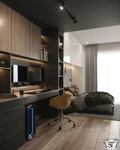 a bedroom with a bed, desk and television on the wall next to a window