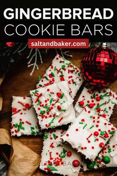 gingerbread cookie bars with white frosting and sprinkles