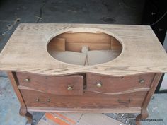 an old wooden dresser has been turned into a cabinet