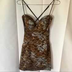 Brand New! Never Been Worn! Beautiful Brown And Light Blue Floral Design. Adjustable Shoulder Straps Zipper In The Back Built In Padded Cups In The Bra Area Brown Floral Print Mini Dress For Party, Brown V-neck Mini Dress For Evening, Brown V-neck Evening Mini Dress, Evening Brown V-neck Mini Dress, Fitted Brown Mini Dress With Floral Print, Brown Fitted Floral Print Mini Dress, Fitted Floral Print Brown Mini Dress, Brown Floral Print Dress For Party, Brown Floral Print Party Dress