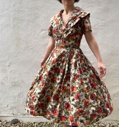 A really very pretty and lovely 50s dress with an iconic statement collar neck, cinched waist and twirly full skirt.  Approx. 38" bust, 26" waist, 40" shoulder to hem. The top of the waistband falls approx. 13" from the shoulder. A really special dress in excellent condition. I bought this as an unfinished 50s dress & had a tailor put in a modern zip, so the side zip is an unobtrusive modern one. Rose Day, Special Dress, Statement Collar, Large Floral Print, Hepburn Style, Collar Neck, Special Dresses, 50s Dresses, Day Dress