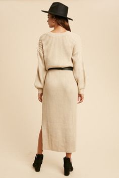 The perfect Midi Sweater Dress everrrr!! The Isn't She Lovely Chunky Knit Sweater Midi Dress features an oversized loose fit and looks great by itself or fashioned with a belt. Side slits and balloon sleeves finish this one of and it wins the Gold for sure! One Size : Length measures 46” from shoulder to hem with a 36” bust and 28” waist with stretch Oversized Beige Sweater Dress For Spring, Cream Long Sweater Dress For Fall, Long Beige Sweater Dress For Fall, Long Beige Ribbed Sweater Dress, Long Ribbed Beige Sweater Dress, Beige Sweater Dress For Fall Loungewear, Chic Neutral Sweater Dress For Winter, Oversized Cream Dress For Fall, Chic Oversized Knit Sweater Dress