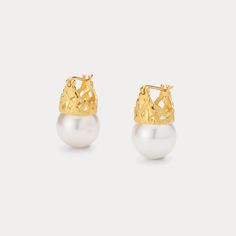 Channel timeless elegance with these Gold Pearl Earrings. Delicate freshwater pearls are nestled within gleaming 18k gold-plated crowns, made from high-quality 925 sterling silver for enduring beauty. Effortlessly chic, these earrings add a touch of sophistication to any outfit, perfect for celebrating anniversaries, weddings, or engagements. Pearls, long revered for their symbolism of purity, innocence, and faith, add a touch of meaningful beauty to this classic design. DETAILS Plating: 18k Gol Elegant Yellow Gold Jewelry With Crown Design, Elegant Yellow Gold Crown Design Jewelry, Elegant Gold Jewelry With Crown Design, Elegant Gold Crown Design Jewelry, Elegant Crown Design Jewelry For Formal Occasions, Elegant Formal Jewelry With Crown Design, Refined Gold Pearl Earrings For Anniversary, Pearl Crown, Graduation Gift Ideas