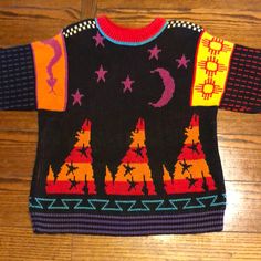 Susan Summa Art To Wear Sweater Tunic. One Of A Kind Pearl Cotton Knit Sweater. Susan Summa Is A Renowned Artist From Santa Fe, Nm Who’s Work Is Featured In The Fine Art Museum Of San Francisco. This Particular Sweater Features Coyotes, Stars, A Snake, Nm Suns, And Geometric Patterns. Fitted Bohemian Sweater With Crew Neck, Fitted Bohemian Crew Neck Sweater, Red Bohemian Top For Winter, Novelty Sweater, Knit Ideas, Sweater Tunic, Santa Fe Nm, Art To Wear, From Santa