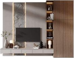 an entertainment center with shelves and a flat screen tv mounted on it's side