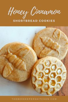 three honey cinnamon shortbread cookies sitting on top of a white plate with the words, honey cinnamon shortbread cookies