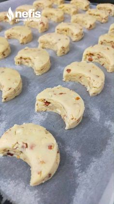 some cookies that have been cut in half on a cookie sheet and are ready to go into the oven