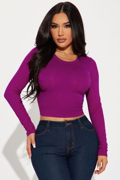 Available In Black, White, Olive, Magenta, Dark Red, Royal, And Teal. Long Sleeve Top Crew Neck Cropped Ribbed Stretch 93% Rayon 7% Spandex Imported | Jaclyn Cropped Long Sleeve Top in Magenta size Small by Fashion Nova Purple Stretch Long Sleeve Crop Top, Purple Long Sleeve Stretch Crop Top, Purple Ribbed Stretch Top, Stretch Purple Tops, Purple Stretch Ribbed Tops, Stretch Purple Elastane Tops, Stretch Purple Ribbed Tops, Stretch Ribbed Purple Tops, Purple Ribbed Top