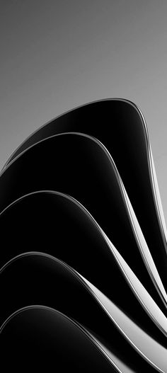 an abstract black and white photo with curves