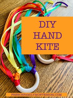 the diy hand kit is made with colorful streamers and ribbon on a wooden table