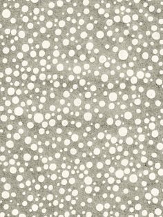 an abstract pattern with white dots on grey paper