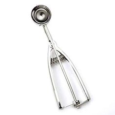 a metal hand mixer on a white background