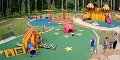 children are playing in an outdoor play area