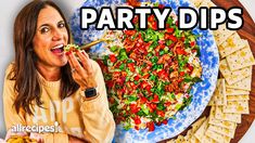 a woman eating food with the words party dips over her face next to a plate of pita chips