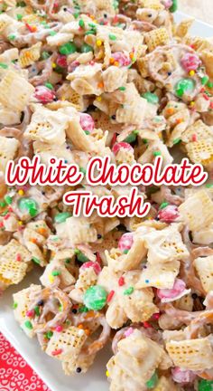 white chocolate and marshmallow snack mix on a plate with the words, white chocolate and marshmallow treat mix