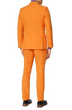 Formal style doesn't have to be rigid and boring. Make it fun with this bright orange two-piece suit and go against the grain with fresh, bold personality. Tailored for a modern fit, it includes a two-button suit jacket and trousers cleanly styled with tonal buttons and stitching, as well as a matching tie to pull the whole outfit together. Jacket has a two-button closure, notch lapels; nonfunctional four-button cuffs; chest pocket; front flap pockets; side vents. Trousers have a zip fly with bu Orange Suits For Spring Formal Events, Spring Orange Tailored Suit, Orange Fitted Blazer For Work, Fitted Orange Workwear Sets, Orange Tailored Suit With Notch Lapel, Orange Notch Lapel Suit For Work, Orange Workwear Sets For Summer, Orange Summer Workwear Sets, Summer Orange Workwear Sets