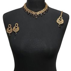 Elegant Jewellery set. Set includes- Earrings  Necklace Tikka Festive Black Necklaces For Celebration, Black Kundan Necklace Gift, Black Kundan Necklace As Gift, Festive Black Temple Jewelry Necklaces, Festive Black Kundan Necklace For Celebration, Black Kundan Necklace Gift For Diwali, Festive Black Temple Jewelry Necklace, Elegant Black Bridal Necklace For Festive Occasions, Gold Jewelry Sets With Stone Work For Party