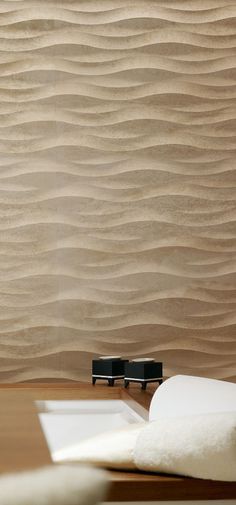 the wall is made up of wavy sand