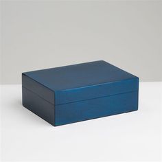 a blue box sitting on top of a white table