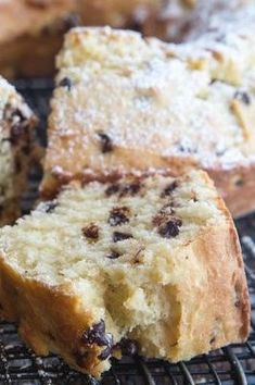 several pieces of cake sitting on top of a cooling rack