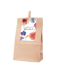 a brown paper bag with flowers on it