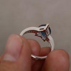 This is a gorgeous handmade creation. Its beauty is its simplicity & Elegance. The 8 mm heart cut faceted London blue topaz is crafted in solid sterling silver and with rhodium plated. All item is sent in a beautiful gift box You can realize more lovely stuff clicking the link https://www.etsy.com/shop/knightjewelry?refshopsection_shophome_leftnav Please leave the correct address and you phone number for delivering successfully. Heart Cut Blue Topaz Ring As A Gift, Heart Cut Blue Topaz Ring For Gift, Gift Heart Cut Blue Topaz Rings, Blue Topaz Heart Cut Promise Ring, Gift Topaz Ring With Accent Stones, Heart Cut, Heart Cut Topaz Ring With Accent Stones For Gift, Heart Cut Topaz Gemstone Ring For Promise, Heart Cut Topaz Ring For Promise, Heart Cut Topaz Promise Ring