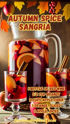 an advertisement for autumn spice sangria with oranges, cranberries and cinnamon