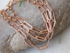 100 % Copper chain Necklace for Women, Antique Chain, Paperclip Copper Chain necklace, Copper Chain, Handmade Jewelry Chain For Pendant, Handmade Copper Chain Metal Purity : Copper Chain : Paperclip Copper Chain Length (Inches) : 18 To 30 inch Chain Closure : Lobster claw Benefits of Wearing Copper Jewelry : It's known to help reduce inflammation, arthritis, headaches, and improve digestions. It helps bring the the body back into alignment. 3 - Amplifies energy, it is an excellent conductor and helps stimulate the flow energy. These pure solid copper are not lacquered so have the best skin contact for best result. Best health result is to wear it all the time. Do not get worried if they go green, just clean regularly with soapy water. The sign of color is showing that acid is present hence Copper Chain Necklace, Jewelry Chain, Trombone, Copper Chain, Handmade Copper, Soapy Water, Reduce Inflammation, Polish Jewelry, Copper Jewelry