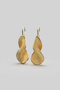 Discover the epitome of elegance with our Italian Gold Drop Earrings. Crafted in Italy from 14k or 18k solid gold, these stunning, modern twisted gold earrings exude sophistication. Elevate your style with the timeless allure of our Oltremare earrings, a true representation of Italian fine jewelry. Experience the charm of these elegant, long gold earrings that seamlessly blend tradition with contemporary design. Customizable Materials: 14k solid yellow gold, white gold, rose gold 18k solid yello Italian Gold Earrings, Twist Jewelry, Yellow Gold Drop Earrings, Long Gold Earrings, Black Gift Boxes, Gold Jewellery Design, Modern Earrings, Gold Drop Earrings, Solid Yellow