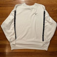 White Large Nike Dri Fit Sweatshirt - Women’s. Super Bright White. Never Worn! Nike White Sweatshirt With Letter Print, Nike White Graphic Print Sweatshirt, White Nike Crew Top, Nike White Crew Top, Nike White Sweatshirt With Logo Print, Nike White Crew Neck Sweatshirt, White Nike Crew Neck Sweatshirt, White Crew Top For Streetwear, Nike White Sweatshirt With Ribbed Cuffs