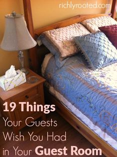 a bed with pillows on it and the words 19 things your guests wish you had in your guest room