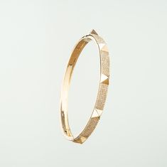 This bangle has a modern edge on a beautiful classic style. We love this as an addition to your stack anyday! 14k solid gold Average diamond weight is 0.77cts Size M - 17cms Width: 6mm Yellow Rose, Gemstone Colors, White Diamond, Solid Gold, Classic Style, Gold Bracelet, Bangles, Yellow Gold, Gemstones