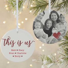 this is us ornament hanging from a christmas tree