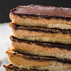 a stack of cake sitting on top of a white plate