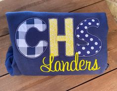 School spirit sweatshirt, School spirit, applique letters, embroidered, high school sweatshirt, school sweatshirt, sweatshirt, kids, adult PRODUCTION TIME: production time is 3-4 weeks plus shipping. PLEASE MAKE SURE THIS WORKS FOR YOU BEFORE PLACING YOUR ORDER.  Love your school! Customize your school spirit! This listing for the name of your school. Appliqué letters with coordinating fabrics.  This listing is for a SWEATSHIRT, not a tshirt. There is a different listing for tshirts!  I am currently 3-4 weeks out plus 3 days for shipping. Please make note of this when ordering. You will receive a shipping notification with a tracking number when your order ships.  Here are the details I need to customize your order: 1) Top name...example Eaton  2) Bottom name....example Eagles 3) School co Appliqué Letters, Applique Letters, School Sweatshirts, School Spirit Shirts, Spirit Shirts, Cheer Mom, Coordinating Fabrics, School Colors, School Shirts