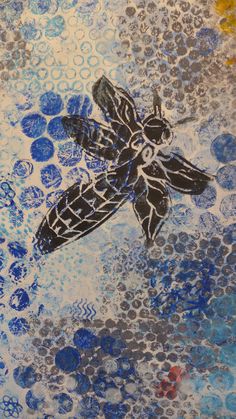 an abstract painting with blue circles and a black dragonfly on it's back