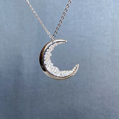 "Crescent Moon Necklace for Mom Friendship Jewelry This necklace features black cubic zirconias to accent the crescent moon and which look like a moon landscape.It is the perfect birthday, anniversary, or Christmas gift that adds shine to just about any outfit, Mothers day gift. Each item is made-to-order, which gives our pieces a unique meaning that is specific and special to you. Measurements: The moon is around 1\" (2,5 cm). The necklace is 16\" (50 cm). Moon jewelry: https://www.etsy.com/sho Silver Moon Necklace For Anniversary, Crescent Moon Charm Necklace For Anniversary, Moon Phase Necklace For Anniversary, White Gold Moon Necklace For Anniversary, Anniversary Crescent Moon Charm Necklace, Anniversary White Gold Moon Necklace, Half Moon Phase Necklace For Anniversary, Silver Crescent Jewelry With Cubic Zirconia, Cubic Zirconia Jewelry With Moon Charm For Gift