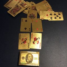 playing cards and money laid out on a table