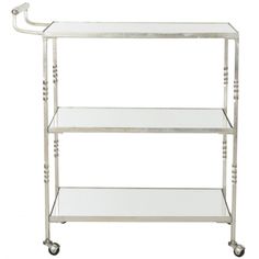 a metal and glass shelf on wheels