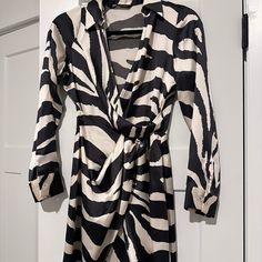 Never Worn Zara Zebra Mini Wrap Dress, In Perfect Condition, Nwt Fit Type: Regular Waist Line: Mid Rise Chest Pad: No Padding Lining: Unlined Length: Short Neckline: Collar Material Composition: 95% Polyester 5% Spandex Stretch: Medium Material: Woven Design Info Occasion: Music Festival/Live House,Party/Clubbing Pattern Type: Animal Pattern Elegant Zebra Print Dress For Night Out, Chic Black Mini Dress With Zebra Print, Casual Zebra Print Mini Dress, Zara Fitted Leopard Print Mini Dress, Chic Zebra Print Mini Dress, Black Long Sleeve Zebra Print Dress, Live House, Zara Mini, Chic V-neck Dress With Zebra Print