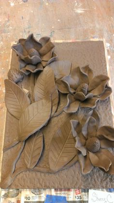 the paper flowers are made to look like leaves