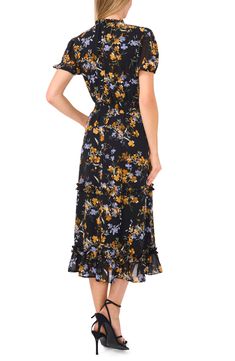 A smocked waist hugs your curves when you slip into this brunch-ready midi dress patterned in soft blooms and trimmed with frothy ruffles. 48" length (size Medium) Slips on over head V-neck Short sleeves Partially lined 100% polyester Machine wash, tumble dry Imported Midi Dress Pattern, Floral Ruffle, Nordstrom Dresses, Dress Pattern, Smocking, Ruffles, Midi Dress, Short Sleeves, Nordstrom